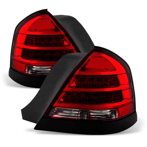 Here you see the black edges on both. . Acanii tail lights